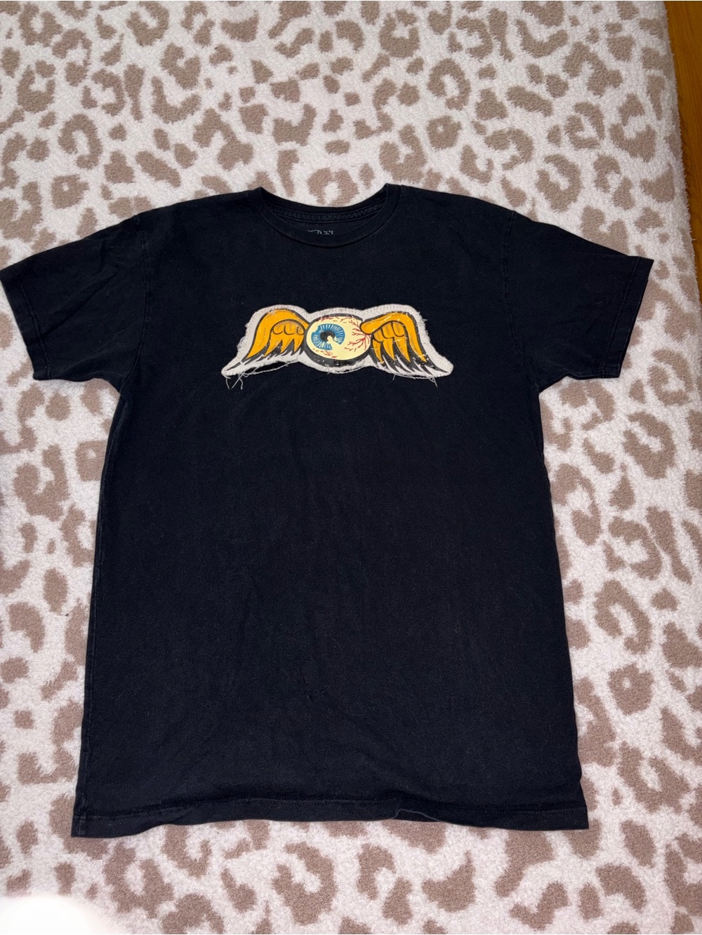 Von Dutch Black Tee with Yellow Winged Eye Graphic